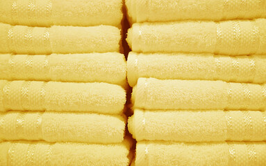 Front View of Pastel Butter Yellow Fluffy Towels Stack