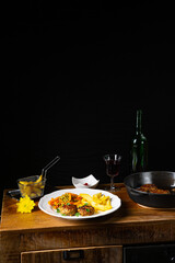 Homemade meatballs with french fries and vegetables