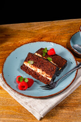 Rustic chocolate cake with raspberries and coffee