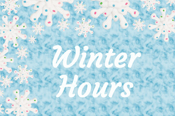 Fototapeta na wymiar Winter Hours message with white snowflake on light blue