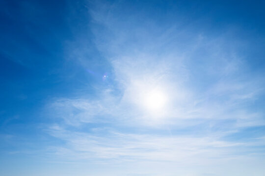 blue sky with clouds and sun in the blue sky background nature background