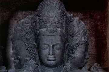 Trimurti in Elephanta caves near Mumbai, Maharashtra, India, Asia