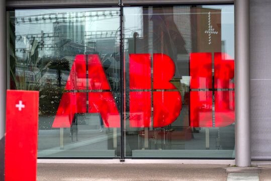 Logo of industry and energy company ABB at entrance of office building at City of Z&uuml;rich. Photo taken December 6th, 2021, Zurich, Switzerland.