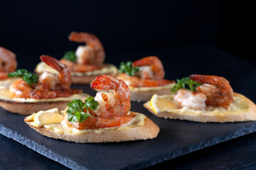 Bruschetta with shrimps, mayonnaise and micro greens. Healthy eating concept