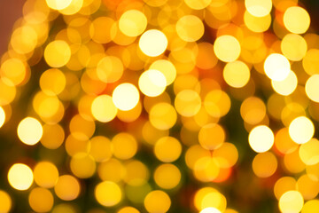 Obraz premium abstract light blur golden yellow bokeh background christmas