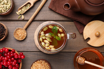 Flat lay composition with immunity boosting drink on wooden table