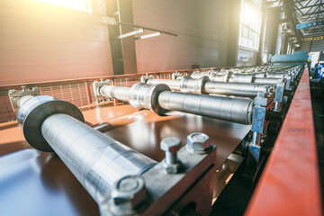 Metal roof tiles production. Production of roofing on automated conveyor belts and lines.