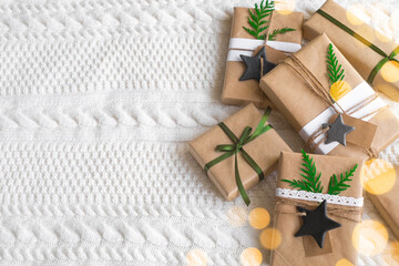 Vintage gift boxes on white background. Eco style gift wrapping: natural rough paper, jute rope,...