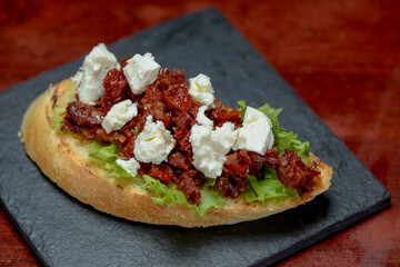 bruschetta with sun-dried tomatoes and feta cheese

