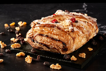 apple strudel with walnuts, raisins and jellied cherries