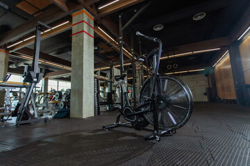 Air bike in the modern gym. Functional training. Gym interior