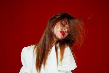 pretty woman fashion hairstyle posing red lips isolated background