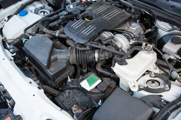 Fototapeta premium A changing car battery, Car battery repairman