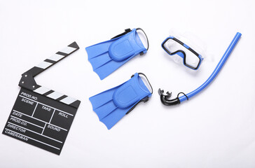 Diving set with clapperboard on a white background. Action movie about the sea concept