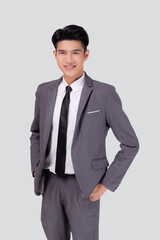 Portrait young asian businessman in suit with confident and friendly isolated on white background, business man smart with success hand in pocket, manager or executive with handsome and leadership.
