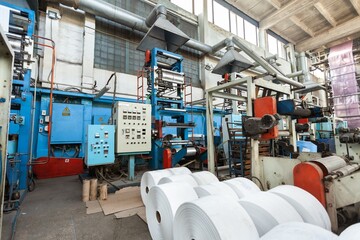 Material on automatic machine for the manufacture of medical masks with nanofiber. Coronavirus Covid-19