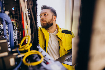 Young man engineer making program analyses