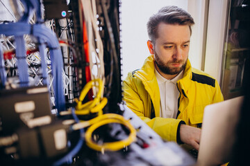 Young man engineer making program analyses