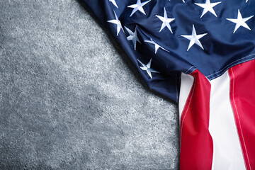 National flag of America on grey table, top view. Space for text - obrazy, fototapety, plakaty
