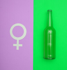 The effect of beer on testosterone, estrogen. Beer bottle and female venus symbol on colored...