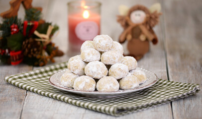 Traditional Christmas snowballs cookies, biscuits covered sugar powder.