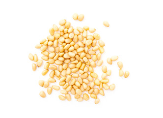 Heap of cedar or pine nuts isolated on white, top view