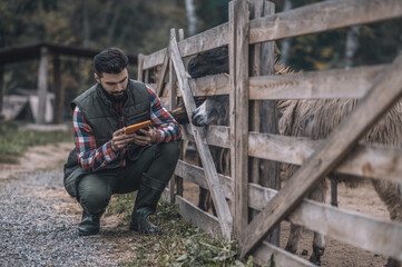 Farmer with a tablet in hands