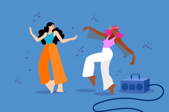 women dancing to music from a portable player