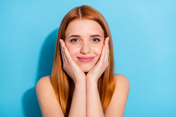 Obraz premium Photo portrait red haired woman wearing casual outfit smiling palms near face isolated pastel blue color background
