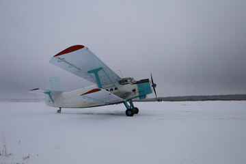Aviation. A biplane is on the runway. © Sky Antonio
