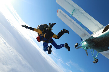 Skydiving. Tandem jump. The flight is in the sky.