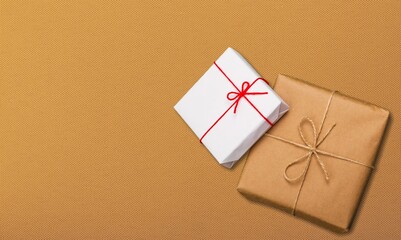 Beautiful giftbox with ribbon bow on the desk