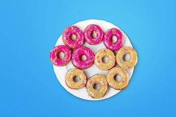 Tasty sweet donut for Hanukkah on desk background