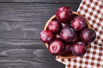 plums fruits natural products on a wooden table top view