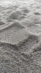 Fototapeta na wymiar a fake beach sand but brings a holiday feeling