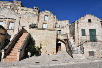 Fototapeta na wymiar Old houses in a street of Matera, an old city in the Basilicata region, Italy.
