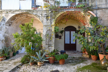 Old houses in a street of Matera, an old city in the Basilicata region, Italy.