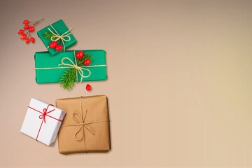 Gifts in eco-friendly paper packaging on a trendy background.