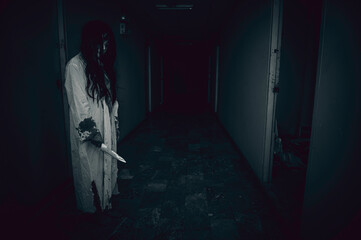Portrait of asian woman make up ghost,Scary horror scene for background,Halloween festival...