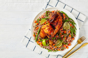 Roasted Half Chicken with brown rice on a platter