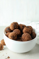 Concept of sweets with truffles on white background