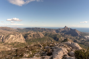 Fototapeta premium Mountainous landscape on a sunny day with clouds.