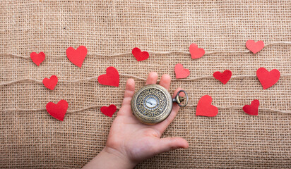  Love concept with pocket watch and  heart shaped icons - obrazy, fototapety, plakaty