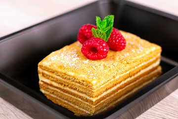 cheesecake with raspberry for food delivery photo