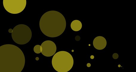 Vector image of yellow bokeh effect against black background with copy space