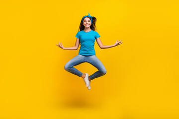 Fototapeta na wymiar Full length photo of young lady jumper meditate peaceful rest balance isolated over yellow color background