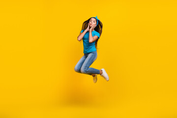 Full size profile sie photo of young girl send air kiss lovely jumper active energetic isolated over yellow color background - obrazy, fototapety, plakaty