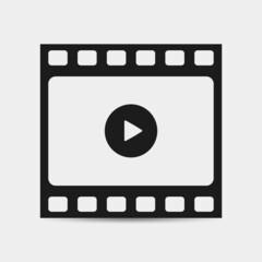 Play video icon isolated on grey background. Film strip with play sign. Cinema tape icon. Vector