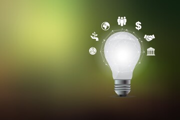 Hand holding light bulb with icon concept for environmental, social, and governance in sustainable and ethical business