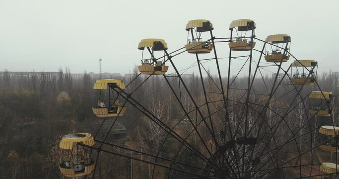 Aerial video of an abandoned Ferris wheel in the Chernobyl amusement park of the Pripyat exclusion zone